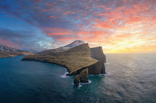 Drangarnir, Vagar, Faroe Islands: Drangarnir are two sea stacks between Vagar and the islet Tindhólmur. The distinct names of Drangarnir are Stóri Drangur and Lítli Drangur which can be translated into Large- and Small sea stack.