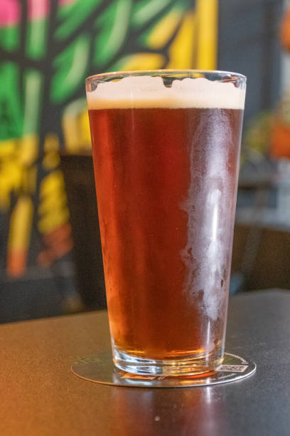 istock refreshing glass of craft ale ipa beer on table blurred background brew pub 1947331072