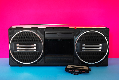 A portable 1980's cassette deck and tapes