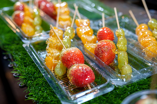 Tanghulu or Tang hulu, also called bingtang hulu, is a traditional Northern Chinese snack consisting of several rock sugar-coated fruits of Chinese hawthorn on a bamboo skewer.