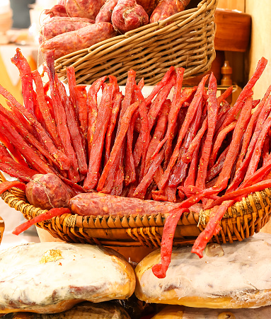 strips of meat seasoned with salt and spices called Coppiette Romane in Italy and matured for about three months