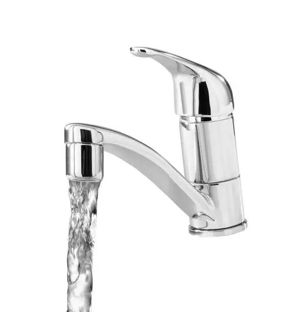 Closeup of water-supply faucet isolated on white background