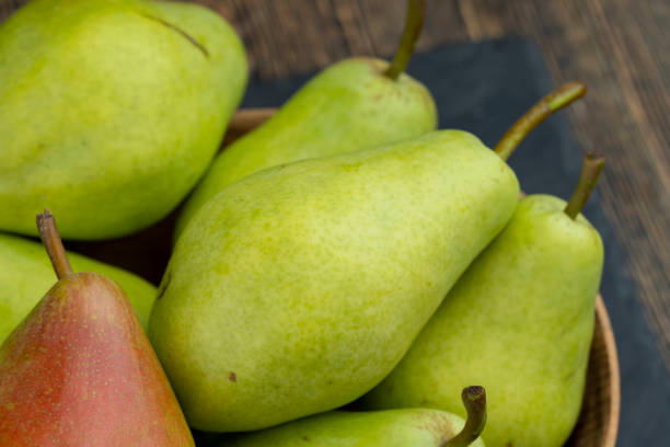 istock fresh harvest of pears on the table in the kitchen 1947407568