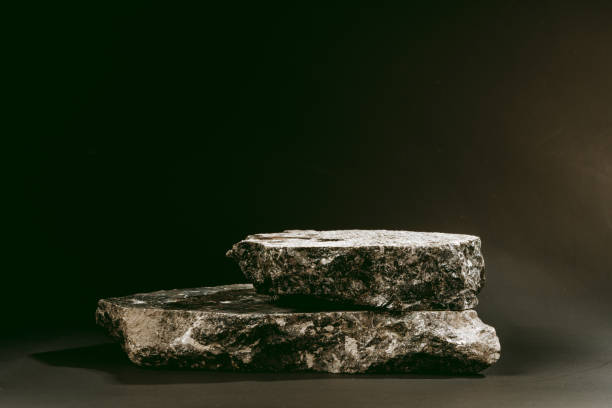 istock Pieces of granite stone on black background studio shot 1947417270