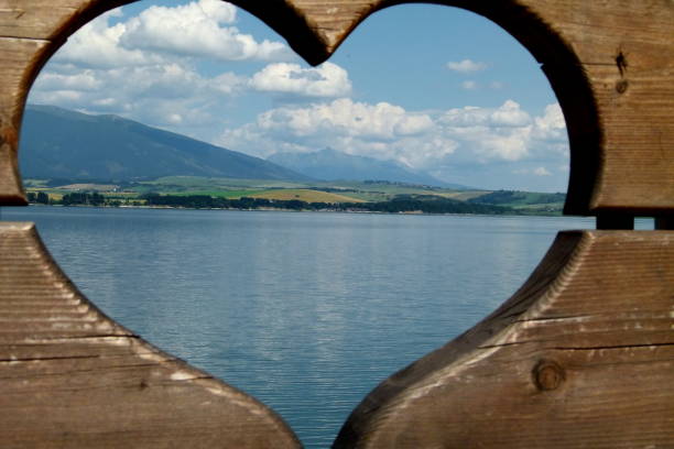 istock Mountain landscape seen through the opening - the heart. 1947463342
