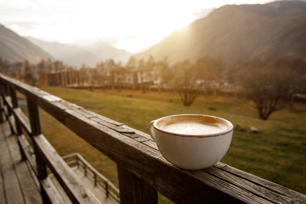 istock Cup of cappuccino with mountain background. 1947466926