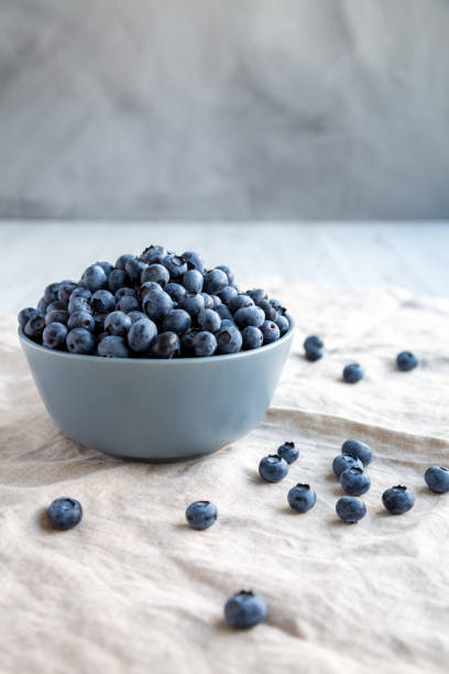 istock Raw Organic Blueberries in a Bowl, low angle view. 1947472311