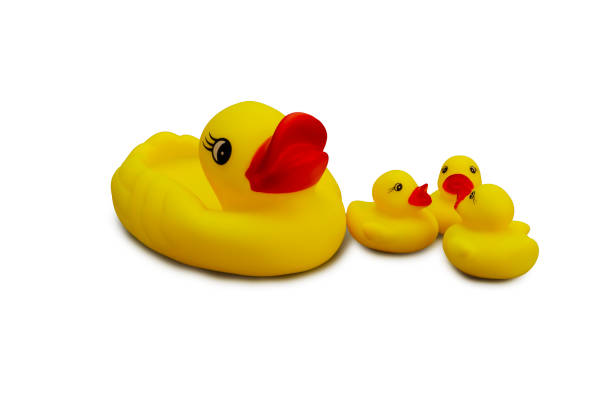 istock Yellow rubber ducks on a white background, children's toy 1947493673