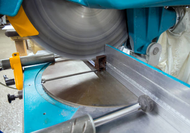 istock Cutting an aluminum profile on a stationary circular saw 1947512408