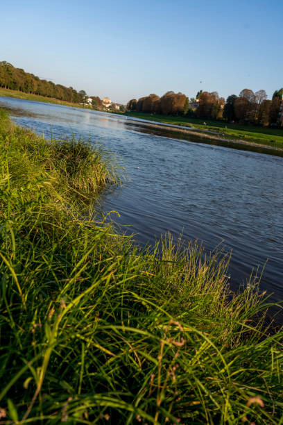 istock River and shore view, river bank in the city 1947517362