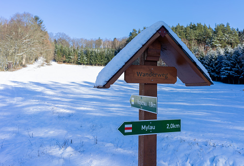 Winter hiking trail with information sign in Vogtland, Saxony Germany