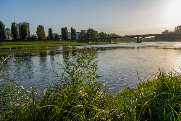 istock River and shore view, river bank in the city 1947517895