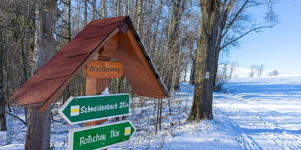 Winter hiking trail with information sign in Vogtland, Saxony Germany