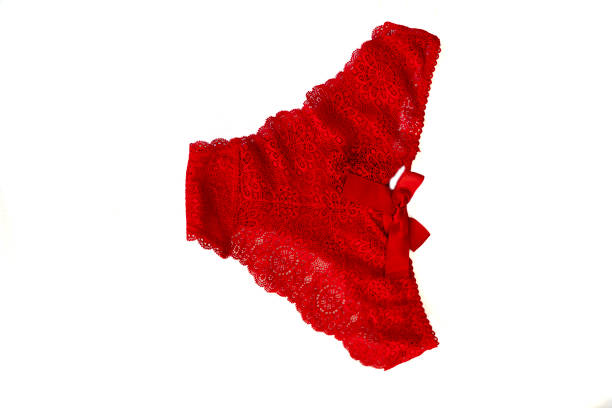 Red lace women's panties , isolated on white background. Luxurious elegant sexy blue women's thong, close-up. fashion lingerie