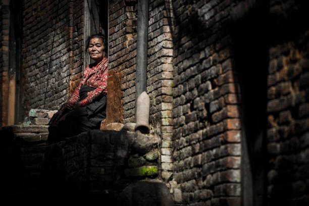 Kathmandu, Nepal- April 20,2023 : Portrait of older Nepalese in Patan Durbar Square.