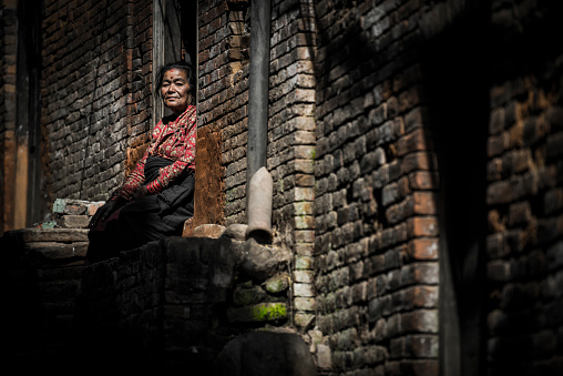 Kathmandu, Nepal- April 20,2023 : Portrait of older Nepalese in Patan Durbar Square.