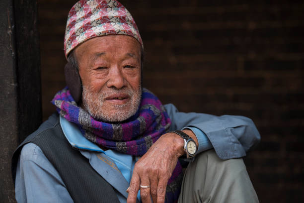 Kathmandu, Nepal- April 20,2023 : Portrait of older Nepalese in Patan Durbar Square.