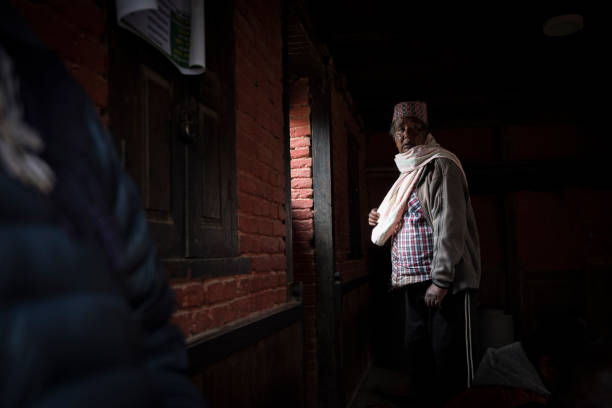 Kathmandu, Nepal- April 20,2023 : Portrait of older Nepalese in Patan Durbar Square.