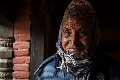 Kathmandu, Nepal- April 20,2023 : Portrait of older Nepalese in Patan Durbar Square.