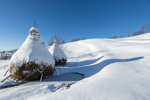 Beautiful winter landscape in morning light. Transilvania, Romania