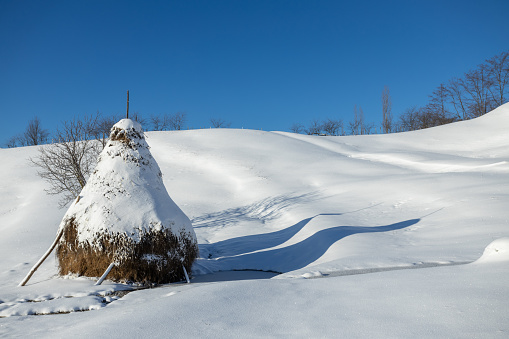 Mountain pass Krzyzowa in winter in Beskid Sadecki. View from Jaworzyna Krynicka Mountain.