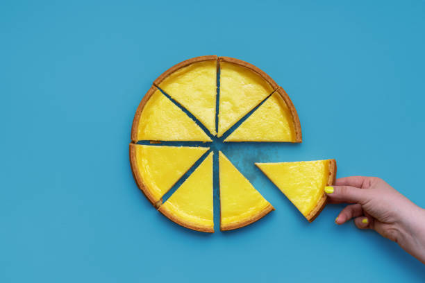 istock Cheesecake top view isolated on a blue background 1947647426