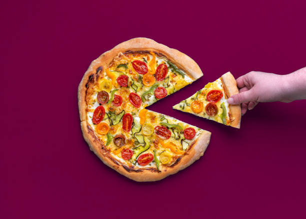 istock Homemade pizza primavera isolated on a magenta background 1947647778