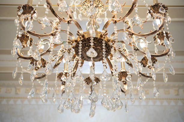 istock Beautiful close up crystal chandelier light with bokeh effect 1947656638