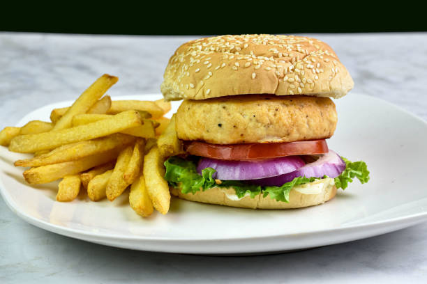istock salmon  burger with tomatoes onions and lettuce 1947672992