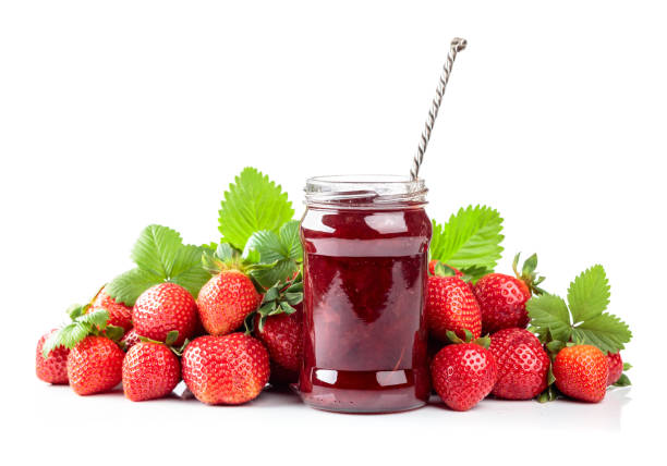 istock Strawberry jam and fresh berries are isolated on a white background. 1947675128