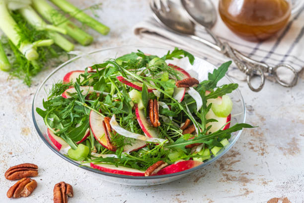 istock Fresh salad with apples, fennel and nuts 1947678425