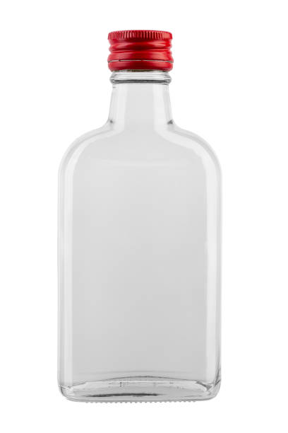 istock Empty glass bottle with red cap  isolated on white background. File contains clipping path. Full depth of field. 1947747992