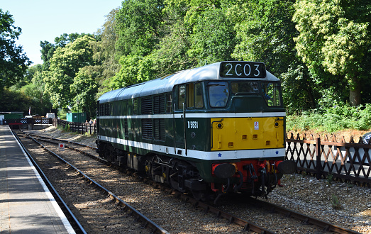 Holt, Norfolk, England - July 10, 2023: Vintage  British Rail Class 31 or Brush Type 2  diesel locomotive at railway platform.