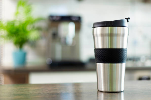 istock Modern Stainless Steel Travel Mug on Kitchen Counter 1947767842