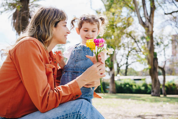 Mother and daughter on the public park
