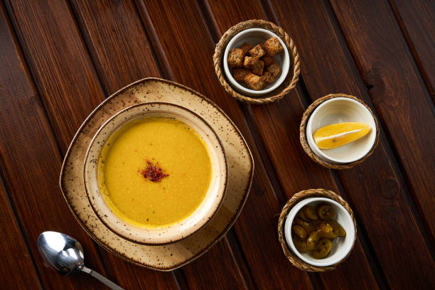 istock Lentil soup with toasted bread and pickles 1947852469