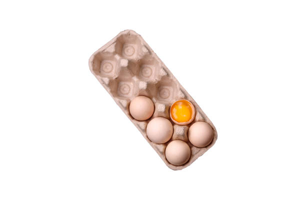 istock Raw chicken eggs in a box, cherry tomatoes, chickpeas, spices, salt and herbs 1947854260