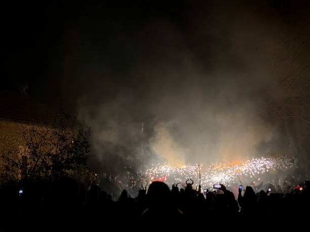 istock Correfoc (in a correfoc a group of individuals will dress as devils and light up fireworks): festival of fire. 1947871944