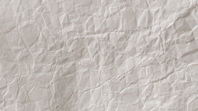 Crumpled Paper Background Texture Loopable Animation 4K Video. Stop Motion Effect Style.