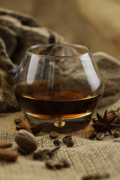 istock Glass of cognac with spices 1947902226