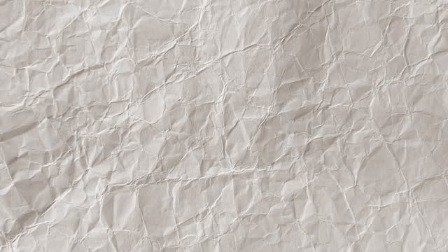 Crumpled Paper Background Texture Loopable Animation 4K Video. Stop Motion Effect Style.