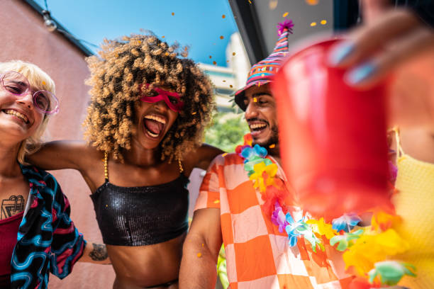 istock Friends enjoying Carnival at home 1947951516