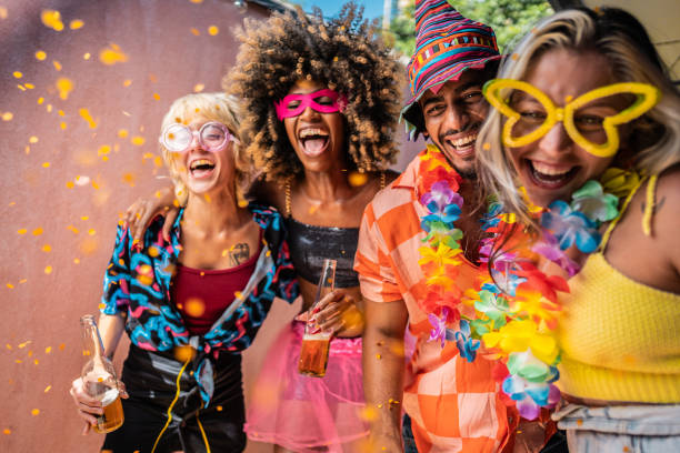 istock Friends enjoying Carnival at home 1947952030