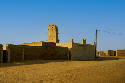 Minaret of the mosque built with the mud and clay in the Agadez, Niger