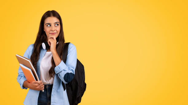 istock Positive pensive teen student woman with backpack, books, study, think 1948015161