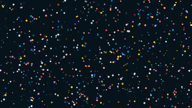istock Christmas background of multicolored round confetti lights on a black background 1948024505