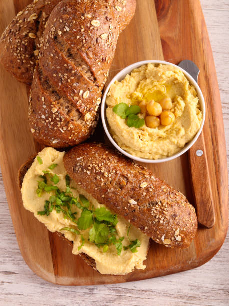 Seed brown buns with homemade hummus