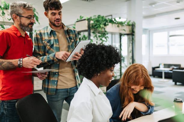 istock Interracial businesspeople working on project and collaborating at office. 1948062954