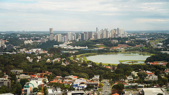 Curitiba aerial cityscape with the Barigui Park in the middle, Curitiba, Parana, Brazil