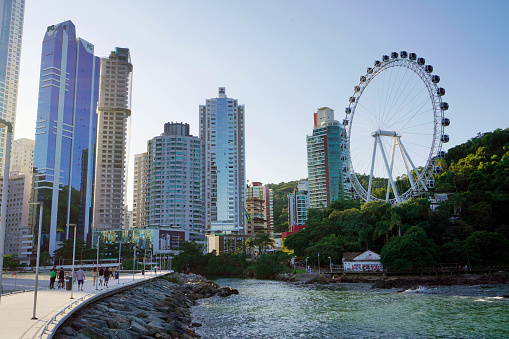 BALNEARIO CAMBORIU, BRAZIL - APRIL 28, 2023: City Skyline with Ferris Wheel in Balneario Camboriu, Santa Catarina, Brazil